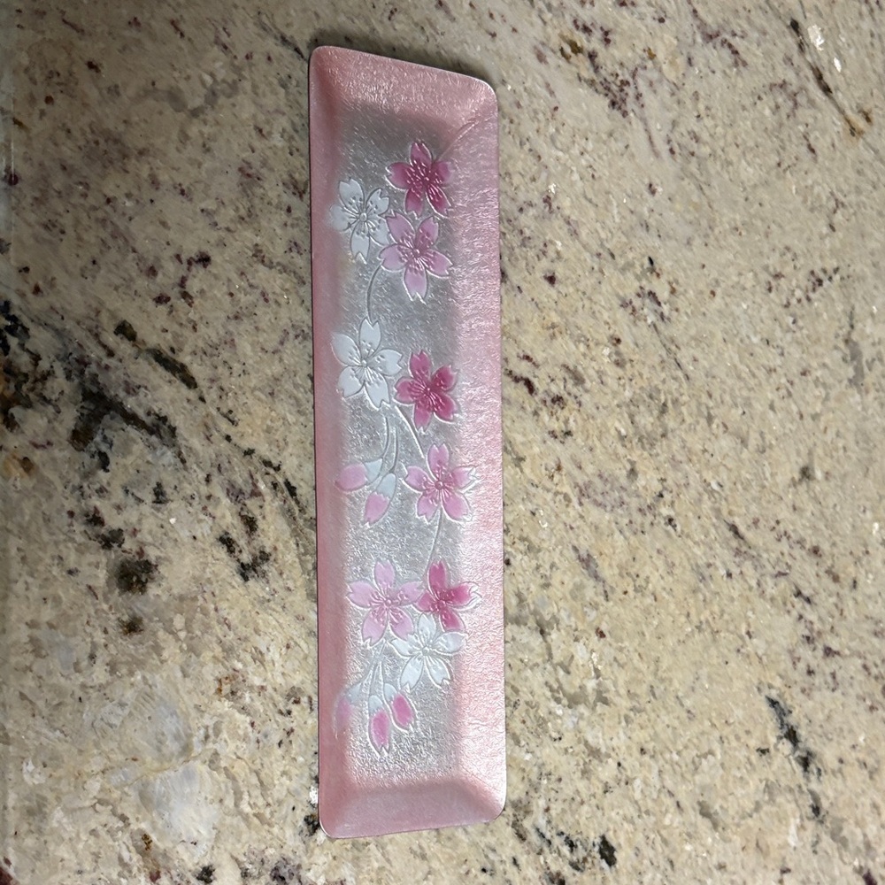 Pink and white small tray.